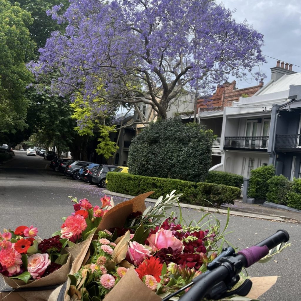 Flower delivery arriving in a Sydney residential street