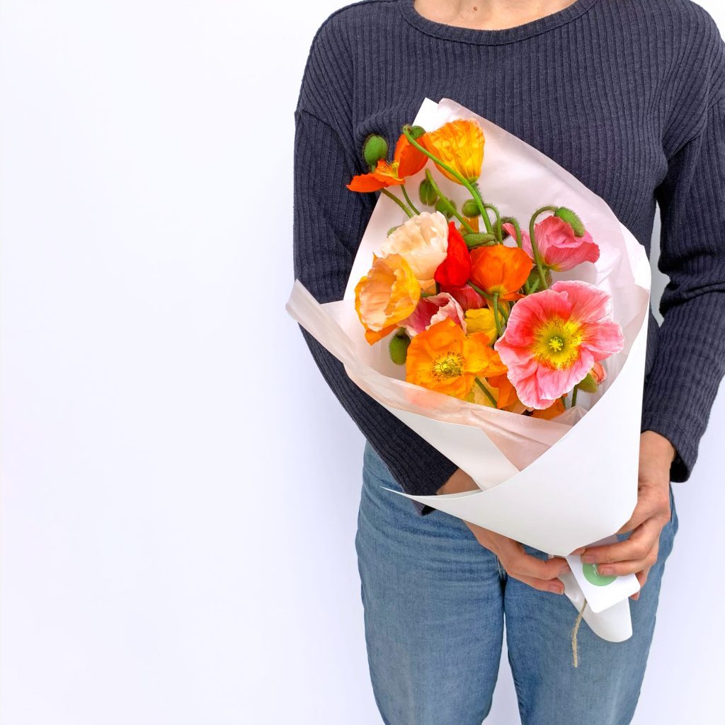 Mixed colour poppy bunch in peach, yellow, red and orange